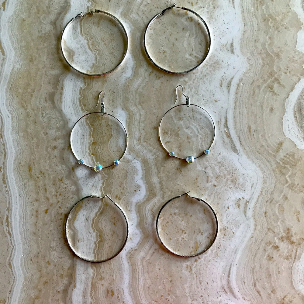 THREE PAIR OF LARGE HOOP EARRINGS